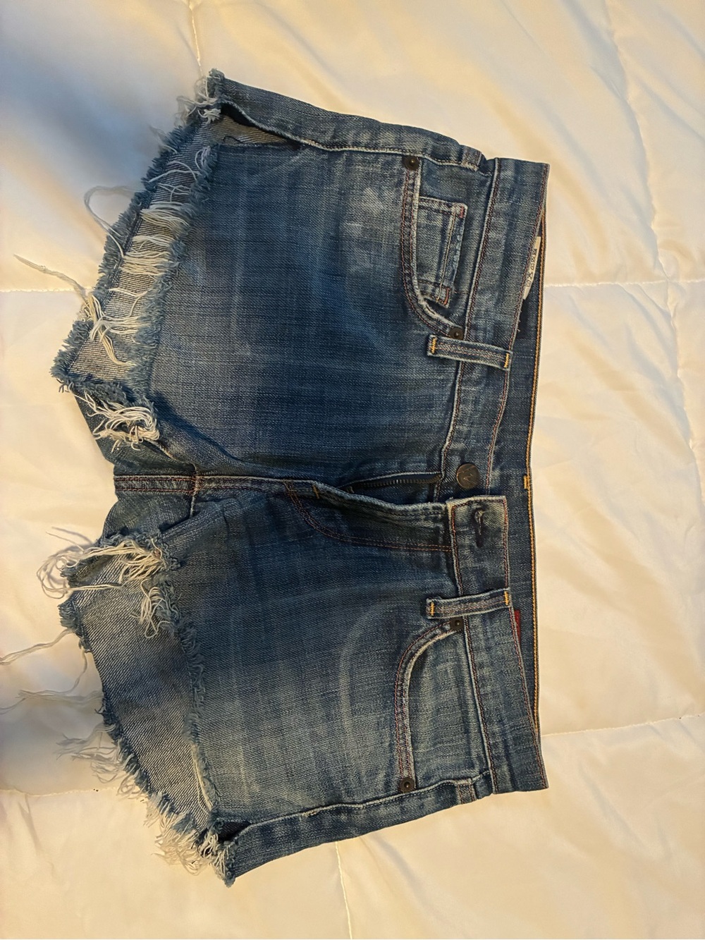 Citizens Of Humanity Distressed Blue Denim Cutoff Shorts. Low Rise.